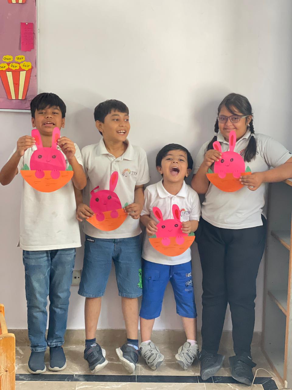 Students celebrating their creative crafts at Majoris